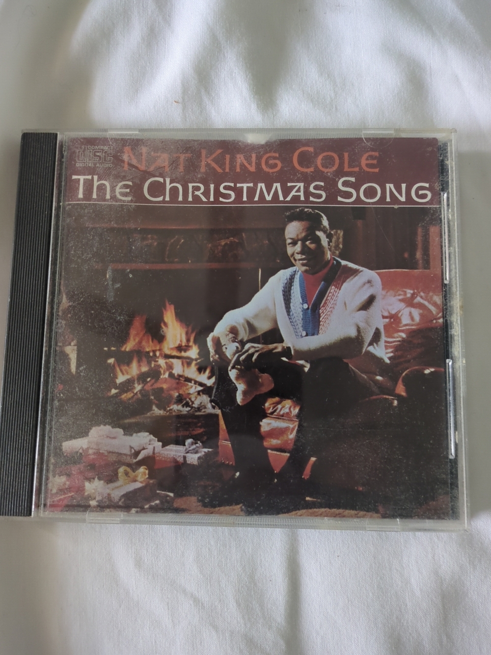 Nat King Cole - The Christmas Song CD (Red, Brown, Black)